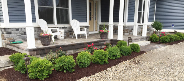 Landscape that compliments a relaxing porch.